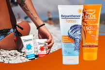 donna che usa crema solare per tatuaggi al mare e migliori creme