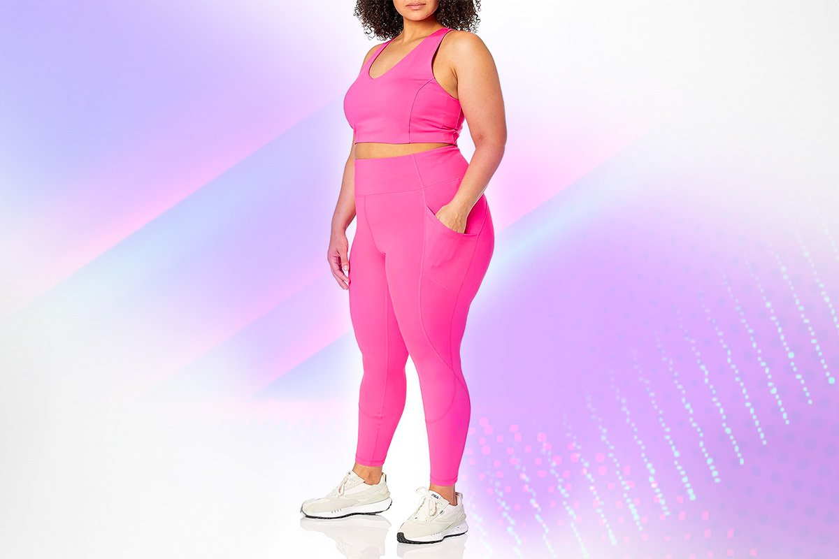donna curvy outfit sportivo rosa